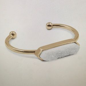 A Kinsley Armelle quartz bracelet.  Gold.  New!